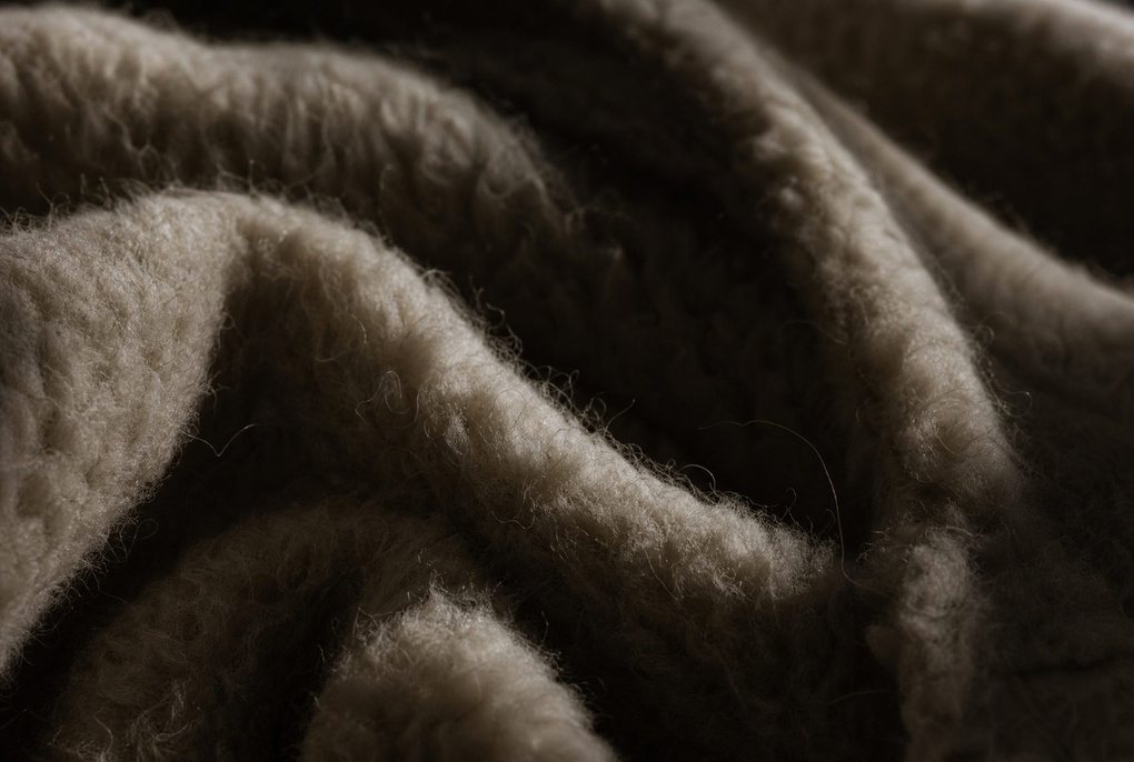 A fold of undyed wool at close range
